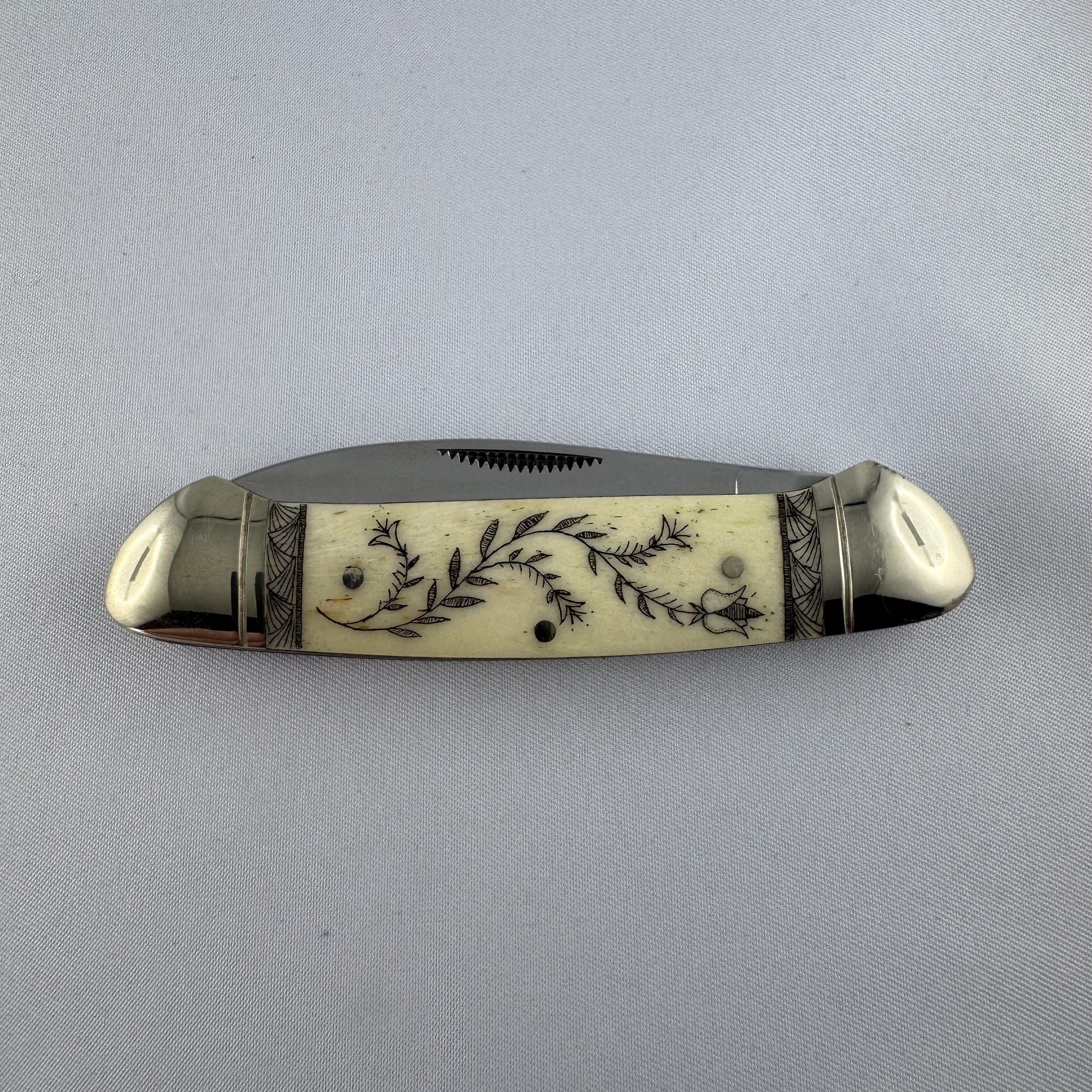 "Flowers & Skull" - RR Canoe with Scrimshaw engraving